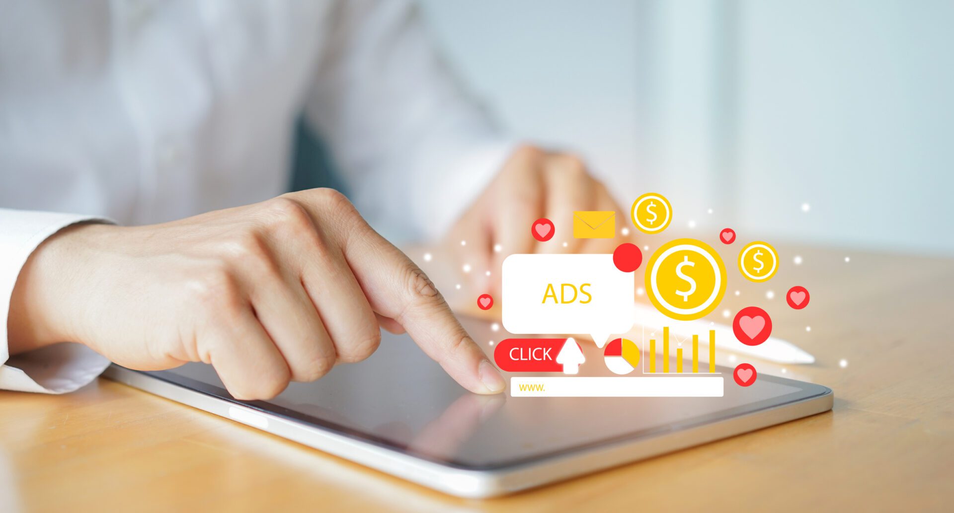 businessman using digital tablet with floating ads, click, and dollar sign icons